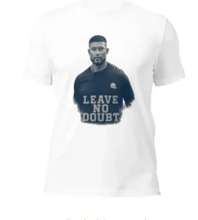 White t-shirt with a faded navy sideline portrait of Marcus Freeman and block letters reading Leave No Doubt